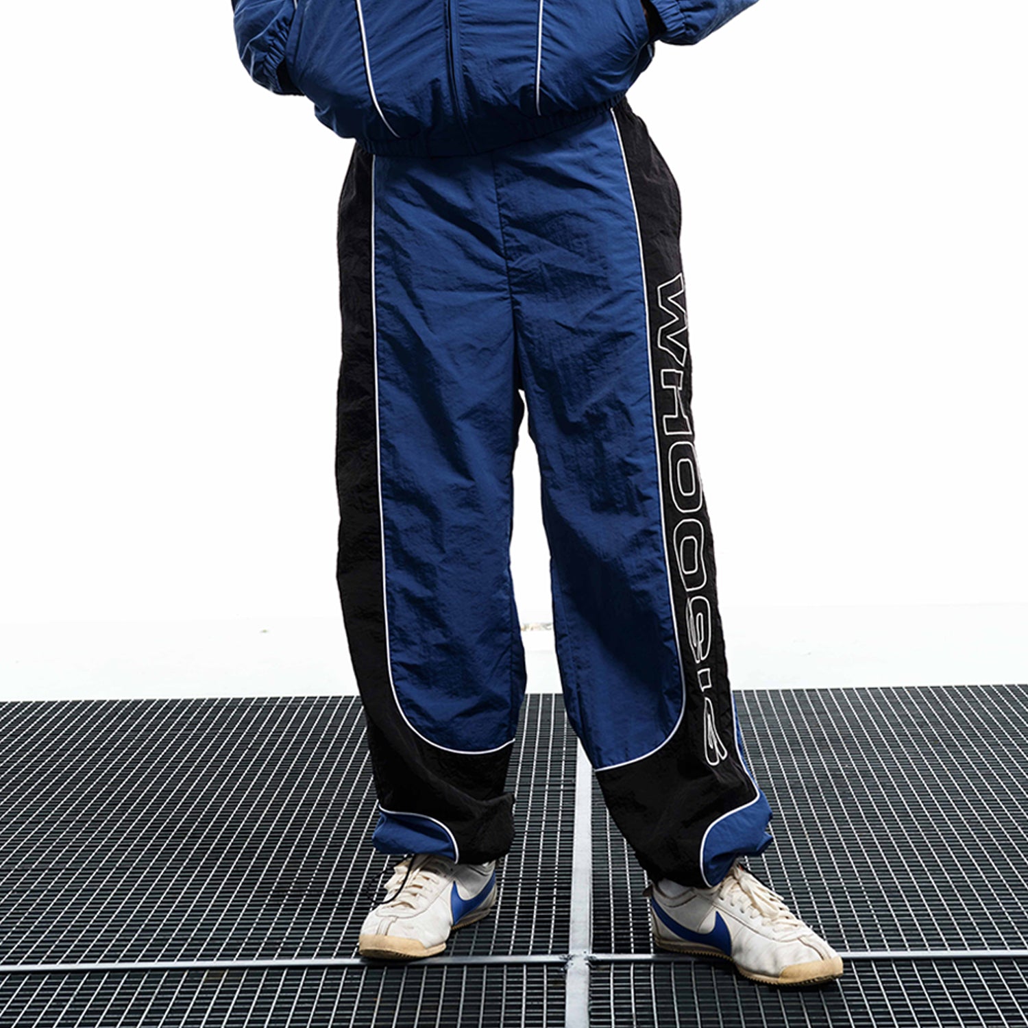 WHOOSIS Color-blocked straight-leg athletic pants